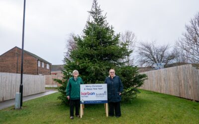 Village residents cheer first Christmas tree in decades
